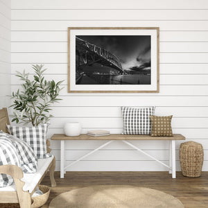 Moody sky over Sydney Harbor in monochrome