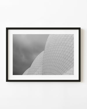 Sydney Opera House roof detail with repeating tiles and sweeping curves in black and white.