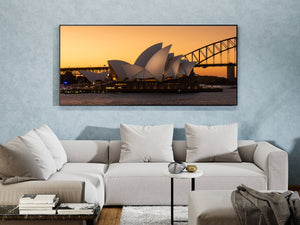 Warm sunset hues over Sydney Opera House
