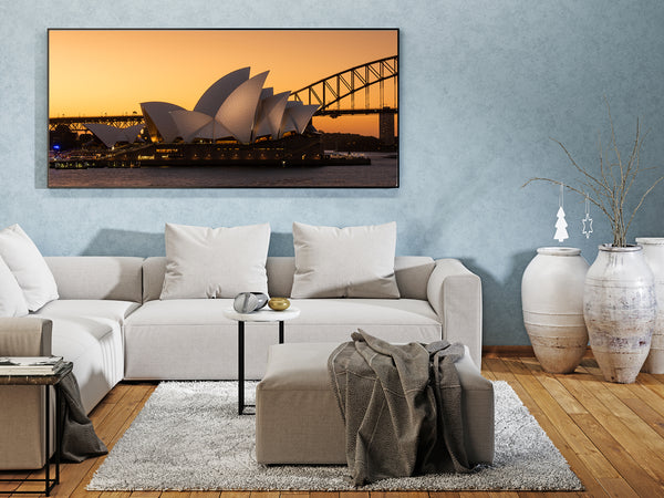 Iconic view of Sydney Opera House and Harbour Bridge at dusk