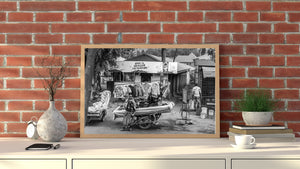 Everyday roadside trade with clothing carts and people outside low-roofed shops.