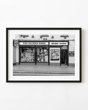 The Record Room shopfront in Sligo with music-filled display windows in black and white.