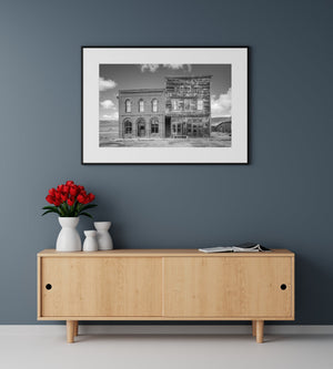 brick hotel and wooden storefront wall art