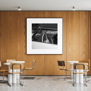 Black and white photo of vintage Cord roadster’s cabin