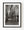 Narrow Tivoli street lined with shuttered facades in black and white