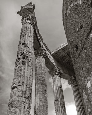 Upward view of weathered Corinthian columns at Tivoli’s Temple of Vesta