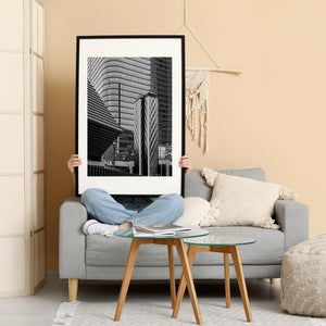Modern Tokyo buildings with repeating windows and reflective metal columns