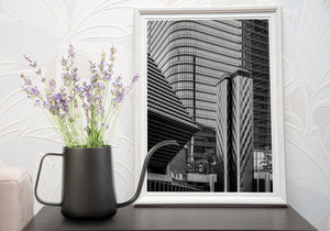 Geometric glass facades surrounding sculptural steel forms in Tokyo