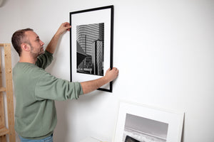 Monochrome architectural study of Tokyo towers and polished steel forms