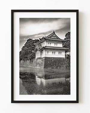 Tokyo Imperial Palace guardhouse reflected in the moat in black and white
