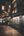 Tokyo night street with glowing signs and a painted metal shutter