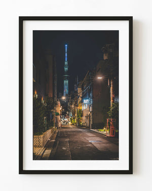Illuminated Tokyo Skytree above a quiet night street