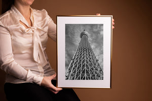 Tokyo Skytree lattice structure rising overhead in monochrome