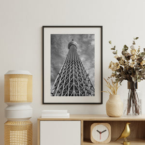 Low-angle view of Tokyo Skytree against textured clouds