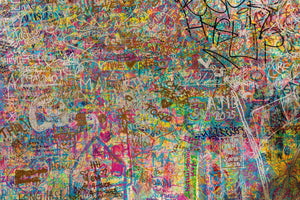 Dense multicolored graffiti wall texture photographed in Shibuya Tokyo