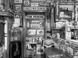 Vintage Route 66 memorabilia and advertising inside Tom Perkins’s shop