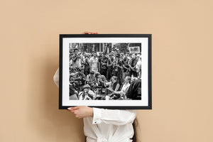Black and white documentary photograph of a Toronto G20 street gathering