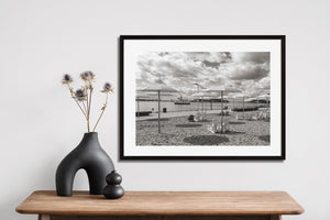 Monochrome waterfront photograph of HTO Park chairs, sand and lake views