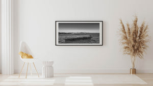 Black and white panoramic Toronto waterfront with rippled lake water