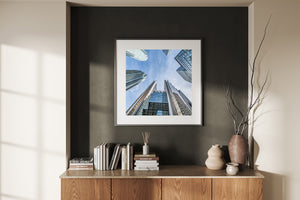 Upward view between Toronto skyscrapers with repeating windows