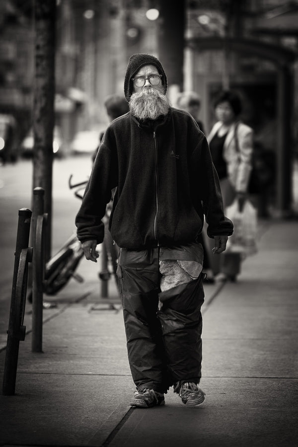 Toronto man with long beard walking street photo