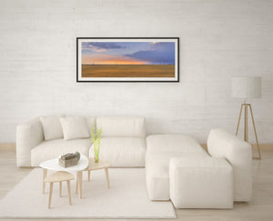 Vast farmland under sunset glow