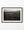 Tuscan village and rolling countryside beneath a cloudy sky in warm monochrome.