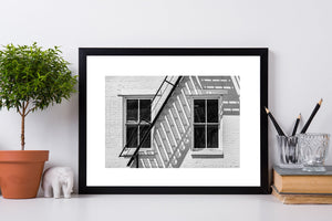 Framed fine art print of two windows and fire escape
