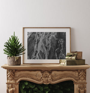 Aerial sediment lines and river curves along remote Alaska coastline