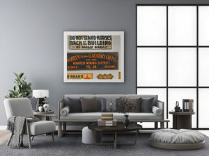 Vintage Warren District advertising sign in orange lettering