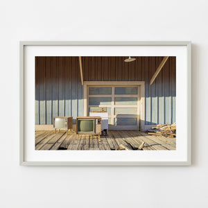 abandoned vintage televisions on wooden dock in Keeler Arizona