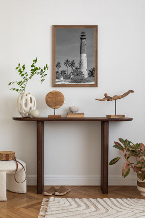 Tall lighthouse rising above vegetation Dry Tortugas