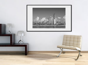 Serene panoramic lighthouse scene in black and white