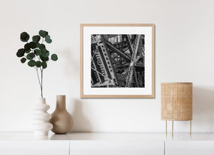 Geometric steel framework of abandoned Chicago bridge in black and white