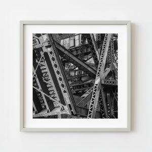 Black and white photograph of abandoned industrial bridge over Chicago River