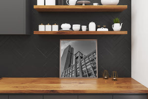 Black and white Chicago riverfront buildings with tall glass tower