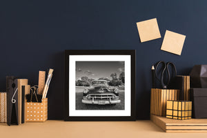 Close front view of vintage Chevrolet grille and chrome bumper