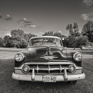 Monochrome photograph of classic Chevrolet along Route 66 Illinois