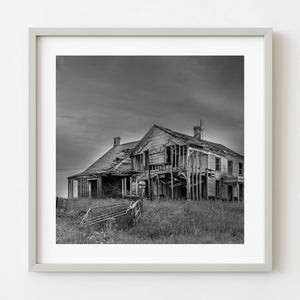 Black and white abandoned farmhouse in rural Indiana