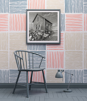 Nautical gear piled around weathered wooden shack