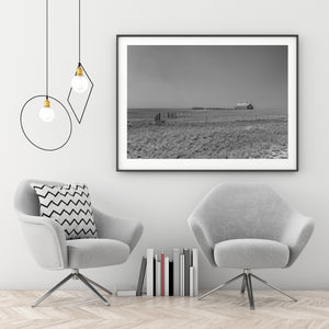 Rural Nebraska farmstead surrounded by open grassland horizon