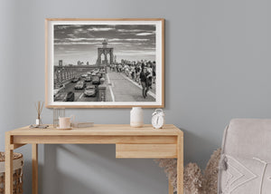 Urban street scene on the Brooklyn Bridge with crowd movement