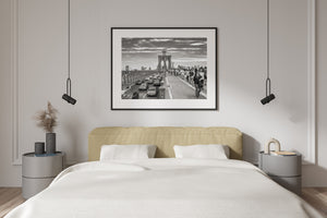 Pedestrians and vehicles sharing the Brooklyn Bridge corridor