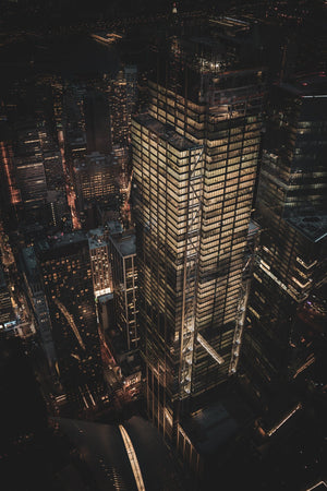 Illuminated Manhattan skyscraper photographed at night