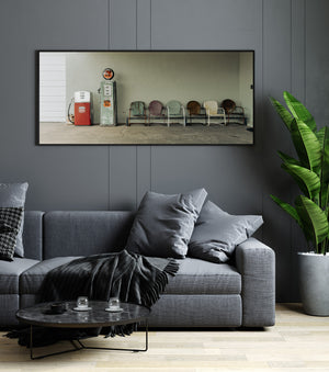 Rusty metal chairs next to Route 66 fuel pump