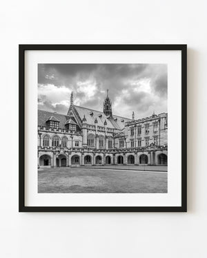 Black and white photograph of the University of Sydney quadrangle and Gothic windows