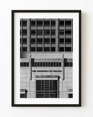 University of Chicago facade with repeating windows and bold signage in black and white.