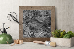 Textured mountain rock with fine lines and dark crevices near Ushuaia