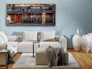 Utah roadside shop with bold food mart lettering and wooden carvings