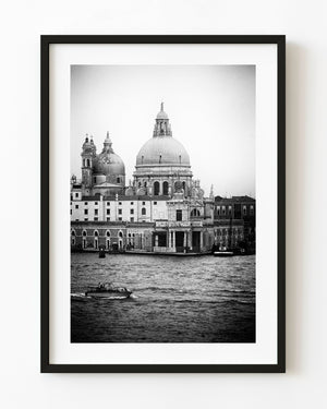 Santa Maria della Salute domes above Venice waterfront in black and white